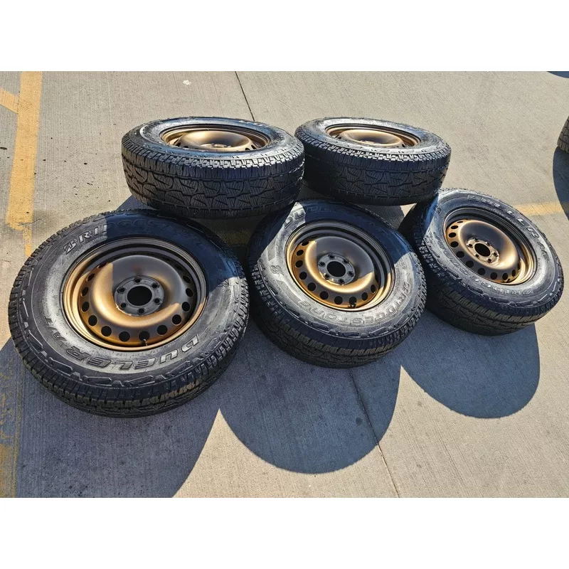 (4) 17″ INEOS Grenadier OEM steel wheels rims BRONZE tires 2024 2025 2026 NEW